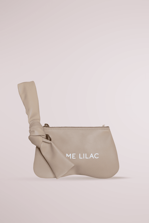
                  
                    Butter pochette sand, by Blame Lilac
                  
                