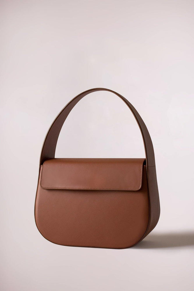 
                  
                    Tan cesta handbag in cow leather, by Blame Lilac
                  
                