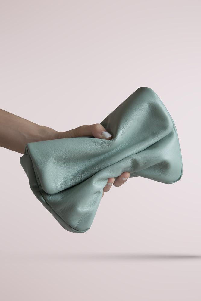 
                  
                    Quiletd fanny pack, crafted from supple lamb leather in mint green colour
                  
                